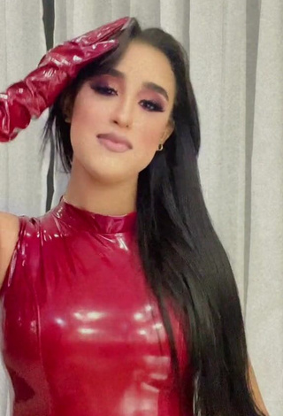 2. Sexy Jenny Camacho in Red Bodysuit