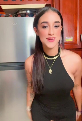 3. Cute Jenny Camacho in Black Overall (Side Boob)