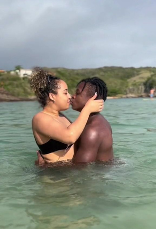 1. Erotic Jordan e Mel Shows Cleavage in Black Bikini Top in the Sea