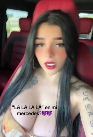 1. Karely Ruiz Demonstrates Elegant Cleavage in a Car (Side Boob)