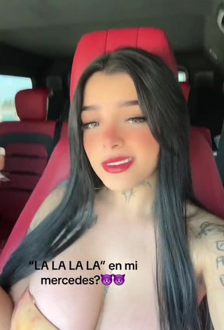 2. Karely Ruiz Demonstrates Elegant Cleavage in a Car (Side Boob)