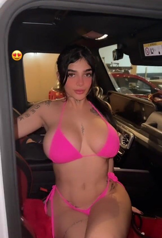 Hot Karely Ruiz Shows Cleavage in Pink Bikini in a Car (Side Boob)