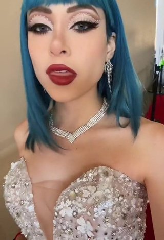 3. Sweetie Legna Hernández Shows Cleavage in Dress (Side Boob)