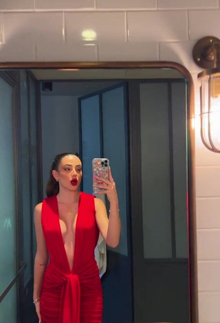 1. Pretty Lola Moreno Marco Shows Cleavage in Red Dress (Side Boob)