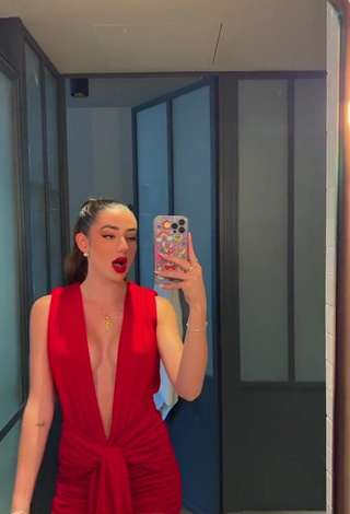 Pretty Lola Moreno Marco Shows Cleavage in Red Dress (Side Boob)