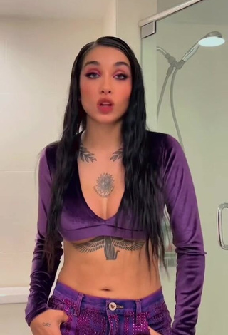 1. Dazzling Maria Becerra Shows Cleavage in Inviting Purple Crop Top (Underboob)