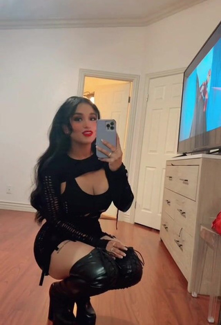 Marlene Santana Shows Cleavage in Alluring Black Dress (Underboob)