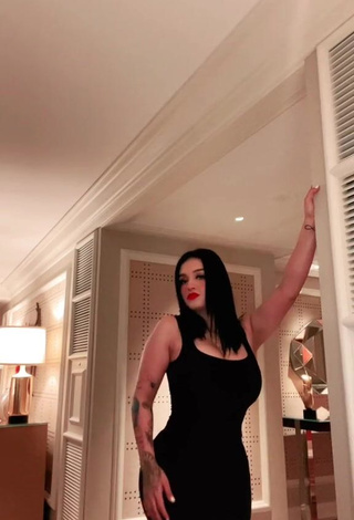 1. Marlene Santana Shows Cleavage in Sexy Black Dress