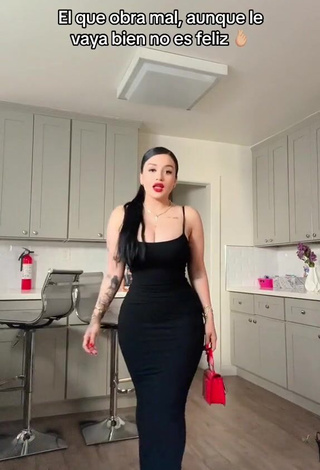 1. Pretty Marlene Santana Shows Cleavage in Black Dress