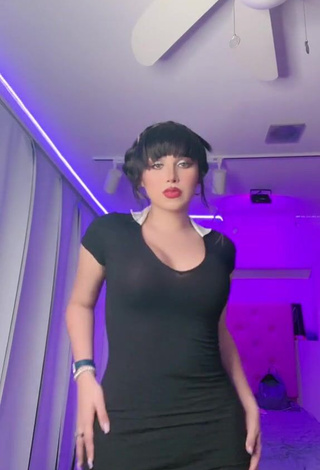 Seductive Mirandah Shows Cleavage in Black Dress