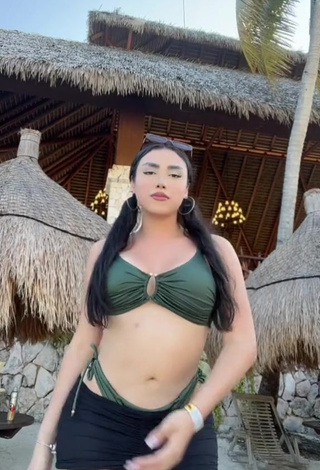 1. Irresistible Mirandah Shows Cleavage in Green Bikini Top