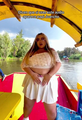 Sexy Maleja Rodriguez Shows Cleavage in White Crop Top on a Boat