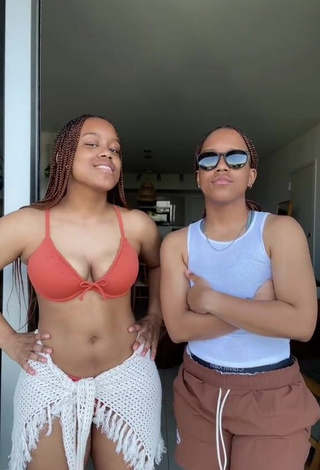 Captivating Treona & Trechelle Andino Shows Cleavage in Orange Bikini Top