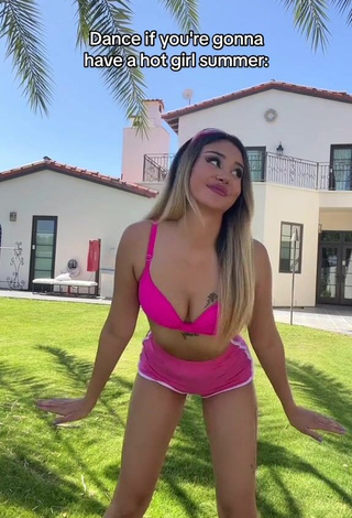 3. Erotic Star Abelar Shows Cleavage in Pink Bikini Top