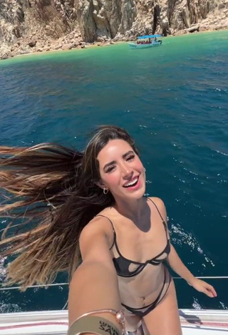 1. Cute Tammy Parra Shows Cleavage in Black Bikini on a Boat