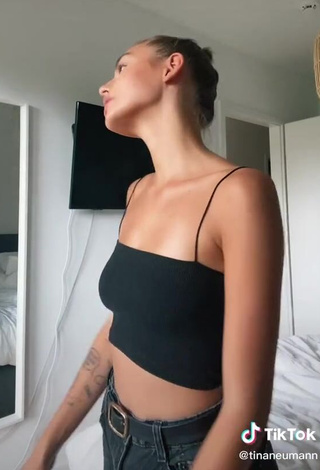 3. Erotic Tina Neumann in Black Crop Top