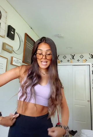 2. Beautiful Universal Sam in Sexy Purple Crop Top