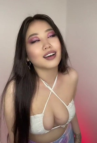 1. Beautiful Ayushieva Erzhena Shows Cleavage in Sexy White Crop Top