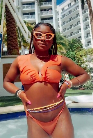 1. Erotic Aba Asante in Orange Bikini at the Pool