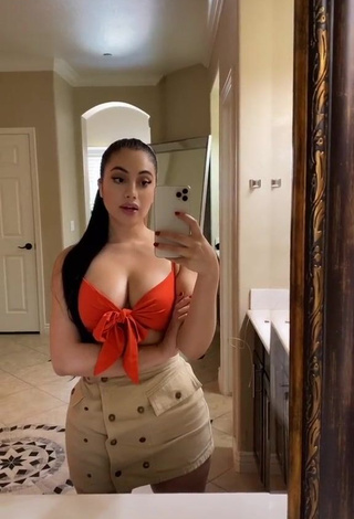 1. Beautiful Jailyne Ojeda Ochoa Shows Cleavage in Sexy Orange Crop Top