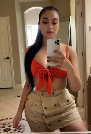 Beautiful Jailyne Ojeda Ochoa Shows Cleavage in Sexy Orange Crop Top