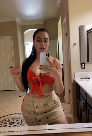 3. Beautiful Jailyne Ojeda Ochoa Shows Cleavage in Sexy Orange Crop Top