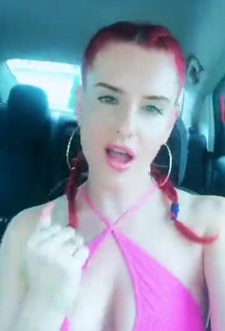 Erotic Justina Valentine Shows Cleavage in Pink Top in a Car