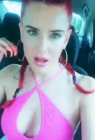 3. Erotic Justina Valentine Shows Cleavage in Pink Top in a Car