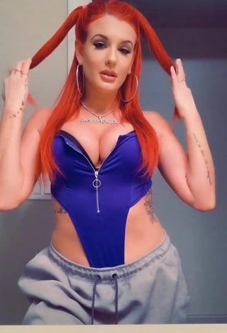 1. Irresistible Justina Valentine Shows Cleavage in Blue Bodysuit