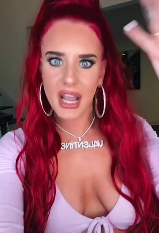 3. Erotic Justina Valentine Shows Cleavage in Purple Crop Top