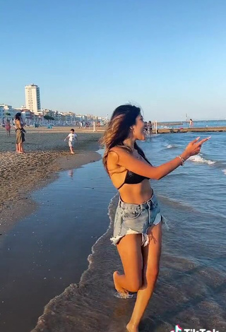 Captivating Melissa & Cassandra Tejada in Bikini Top at the Beach