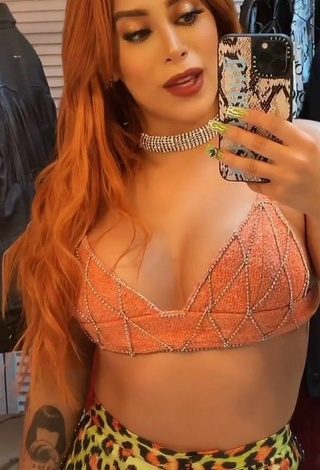 1. Alluring Kim Shantal Shows Cleavage in Erotic Orange Crop Top