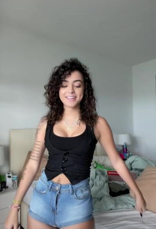 3. Beautiful Malu Trevejo Shows Cleavage in Sexy Black Top