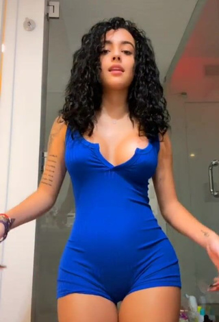 1. Irresistible Malu Trevejo Shows Cleavage in Blue Overall