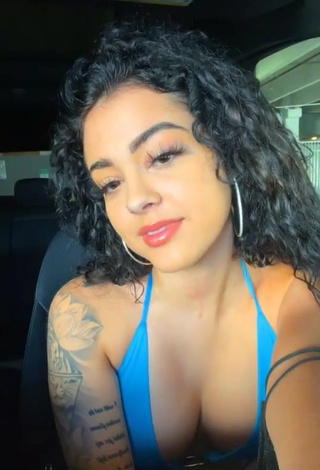 Seductive Malu Trevejo Shows Cleavage in Blue Bikini Top