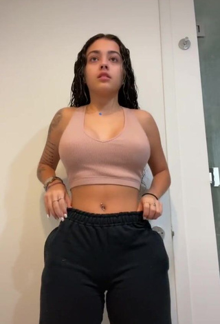 1. Elegant Malu Trevejo Shows Cleavage in Beige Crop Top