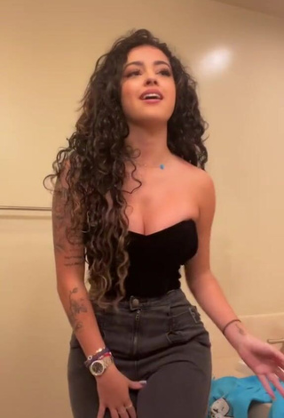 3. Hot Malu Trevejo Shows Cleavage in Black Top