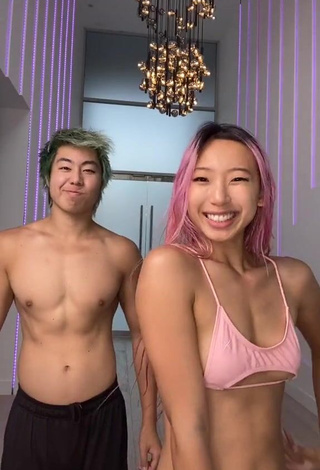 1. Captivating Michelle Chin in Pink Bikini Top (Underboob)