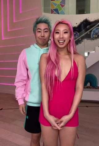 Erotic Michelle Chin in Pink Overall