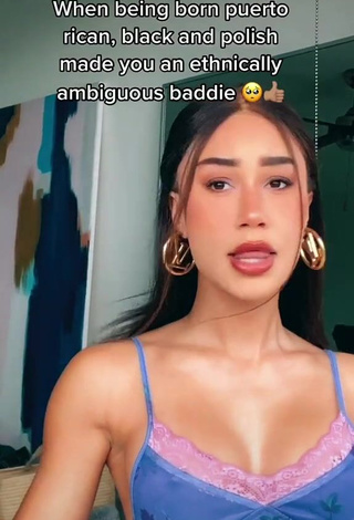 1. Erotic Eva Gutowski Shows Cleavage in Top