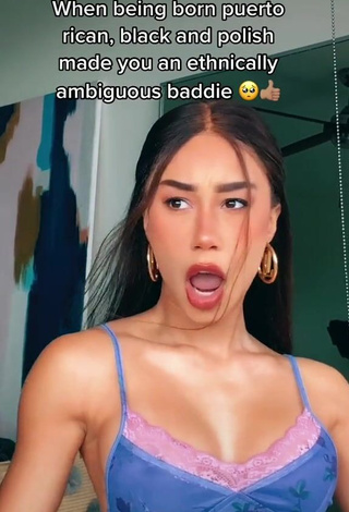 Erotic Eva Gutowski Shows Cleavage in Top