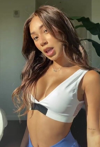 1. Erotic Eva Gutowski Shows Cleavage in White Sport Bra