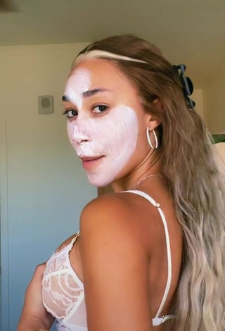 Erotic Eva Gutowski Shows Cleavage in White Bra