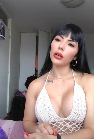 1. Erotic Natalia Shows Cleavage in White Hot Top