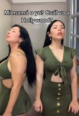 1. Erotic Natalia Shows Cleavage in Olive Dress