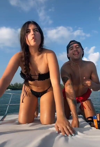 1. Captivating Nicole García in Black Bikini on a Boat