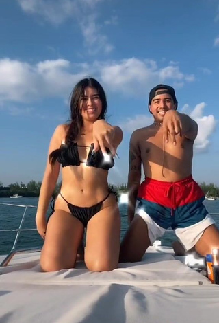 3. Captivating Nicole García in Black Bikini on a Boat