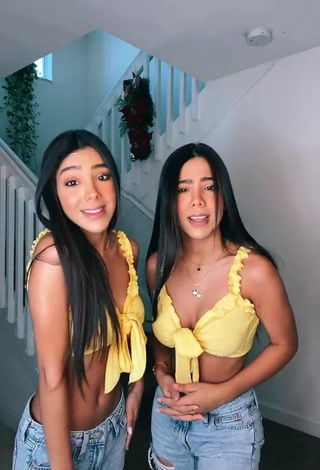 1. Erotic Melanie & Meila Shows Cleavage in Crop Top