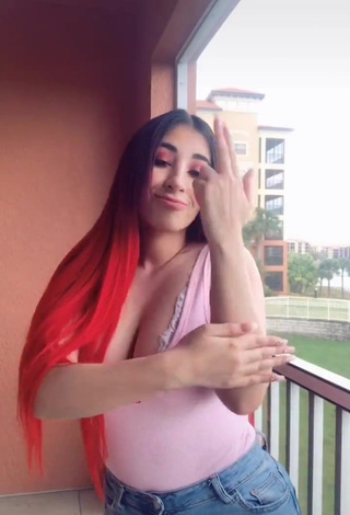 1. Erotic Ana Daniela Martínez Buenrostro Shows Cleavage in Pink Top on the Balcony