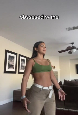 Cute Sienna Mae Gomez in Green Bra